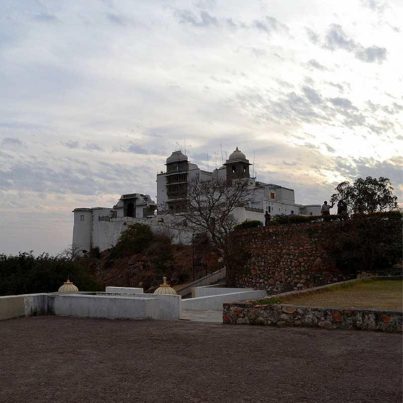 Scenic road leading to Sajjangarh Palace.jpg