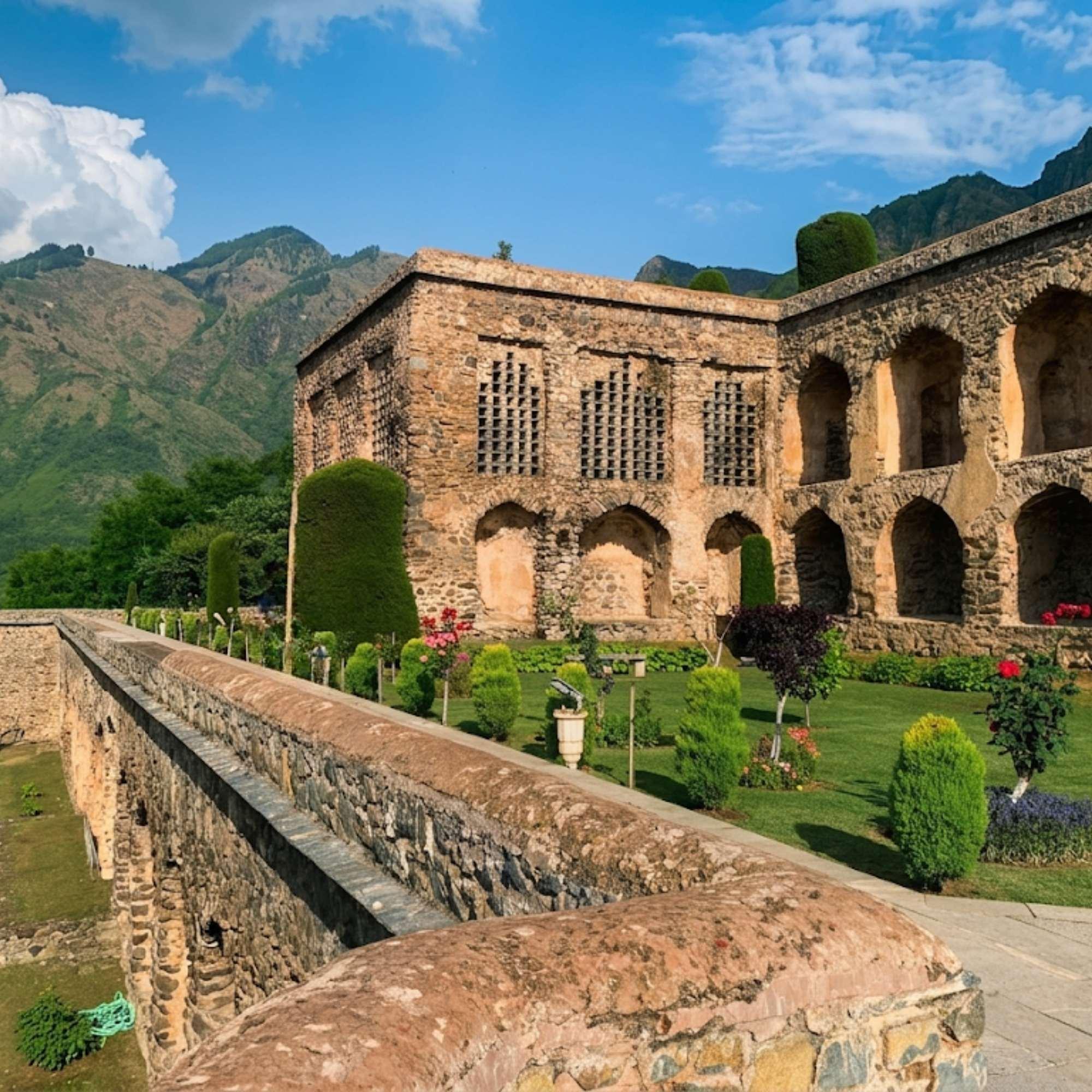 Pari Mahal on the Zabarwan hills with mountains behind
