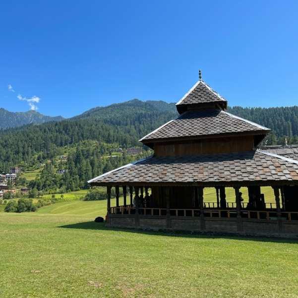 The Shangchul Mahadev Temple and the Shangarh Meadow with deodar forest and mountains in the background