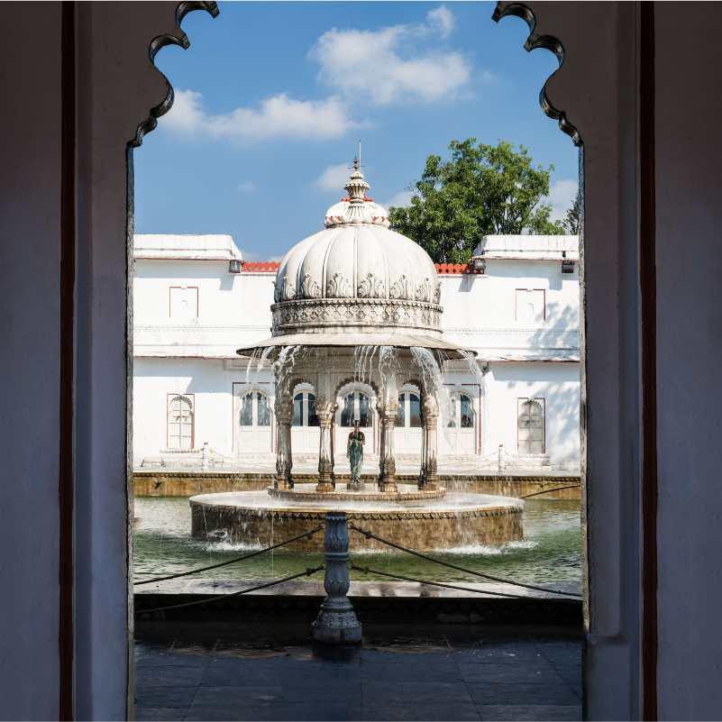 Tourists exploring Saheliyon Ki Bari in Udaipur.jpg