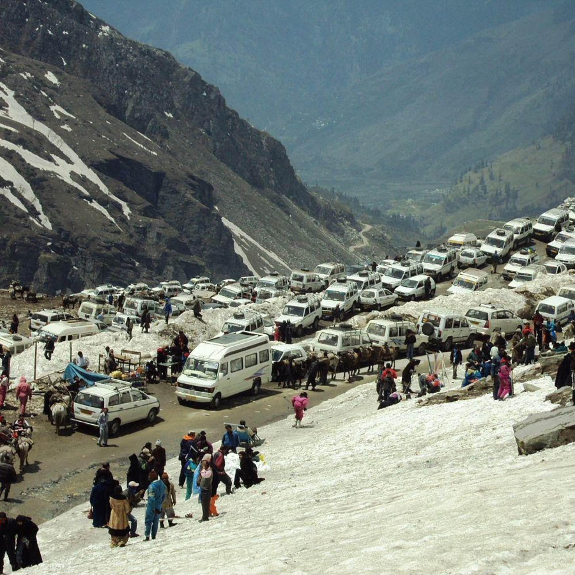 Scenic view of Rohtang Pass in Himachal Pradesh with snow and barren peaks