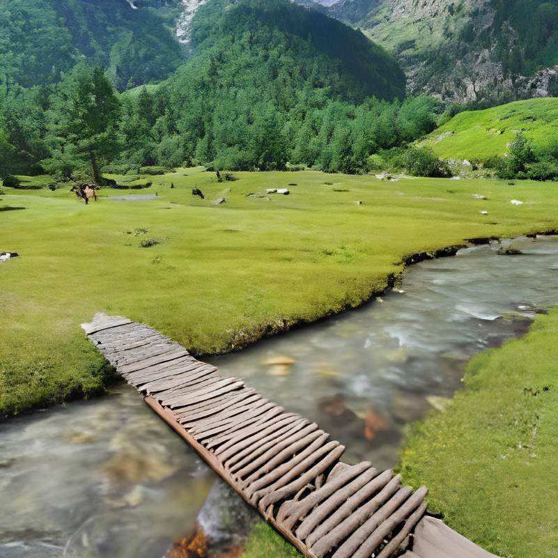 Rakcham village with mountains and the Baspa River in Sangla Valley