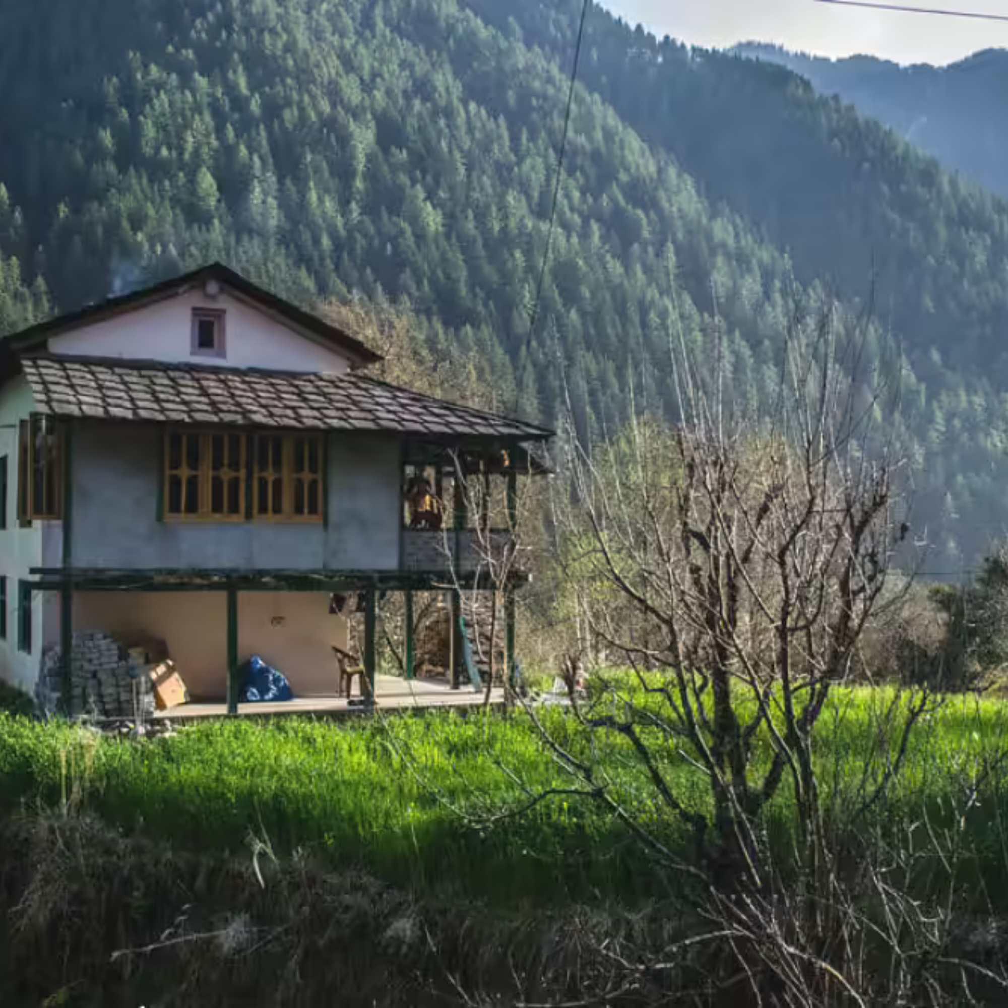 Traditional wooden houses and natural beauty showcasing the charm of Chalal Village.jpg