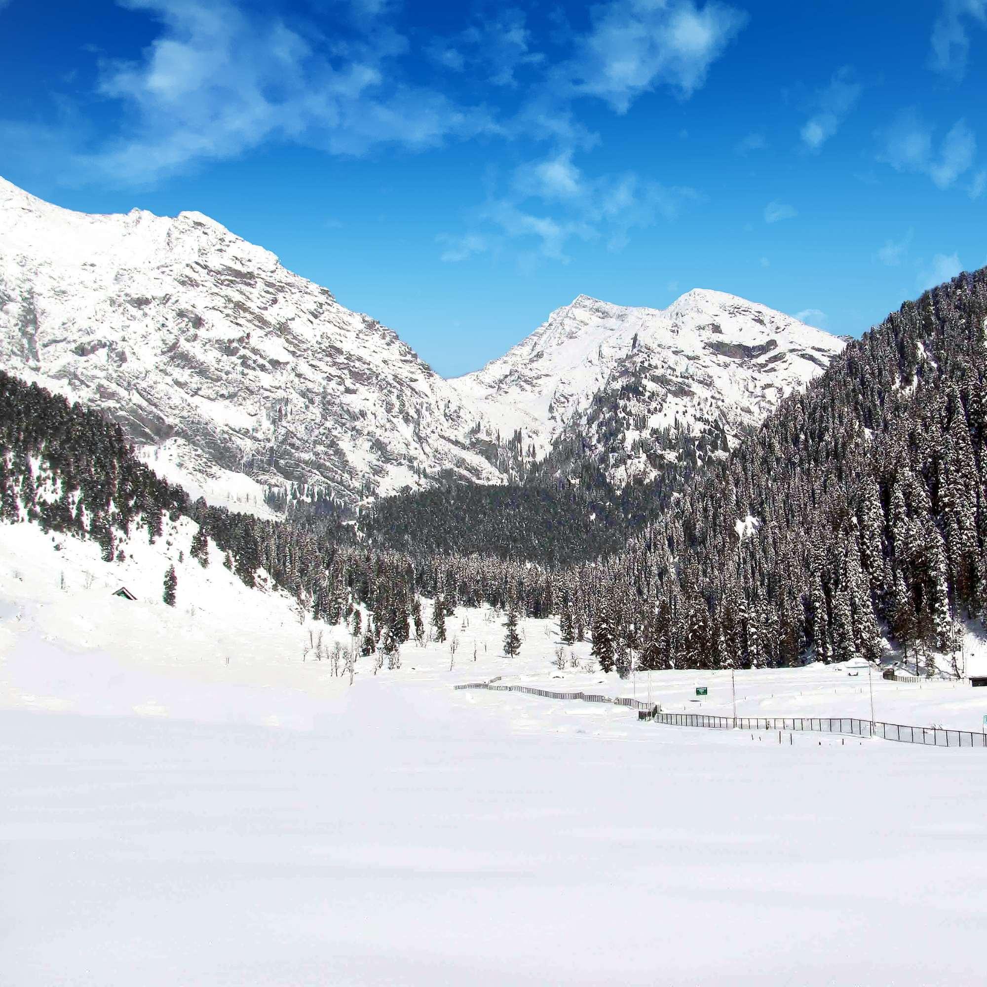 Aru Valley in winter with snow capped Himalayan peaks
