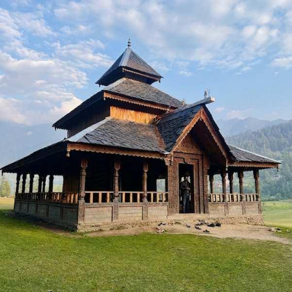Shangchul Mahadev Temple, a three tiered Kath Kuni wooden temple at the edge of the Shangarh Meadow in Sainj Valley, Kullu district