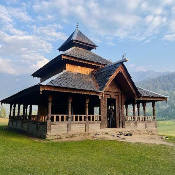 Shangchul Mahadev Temple, a three tiered Kath Kuni wooden temple at the edge of the Shangarh Meadow in Sainj Valley, Kullu district