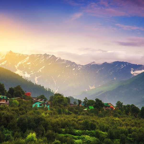 Solang Valley near Manali with green meadows and snow capped mountains in the background