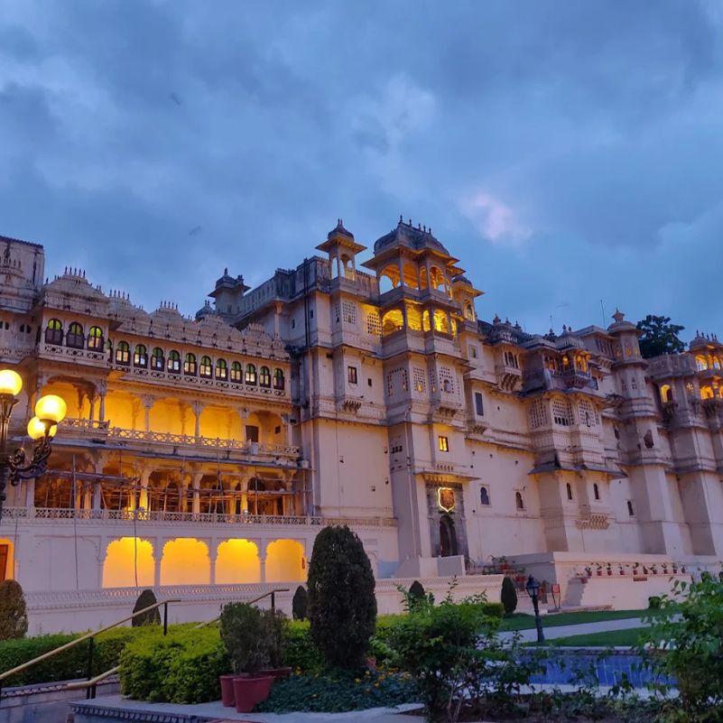Tourists exploring the historic City Palace in Udaipur.jpg