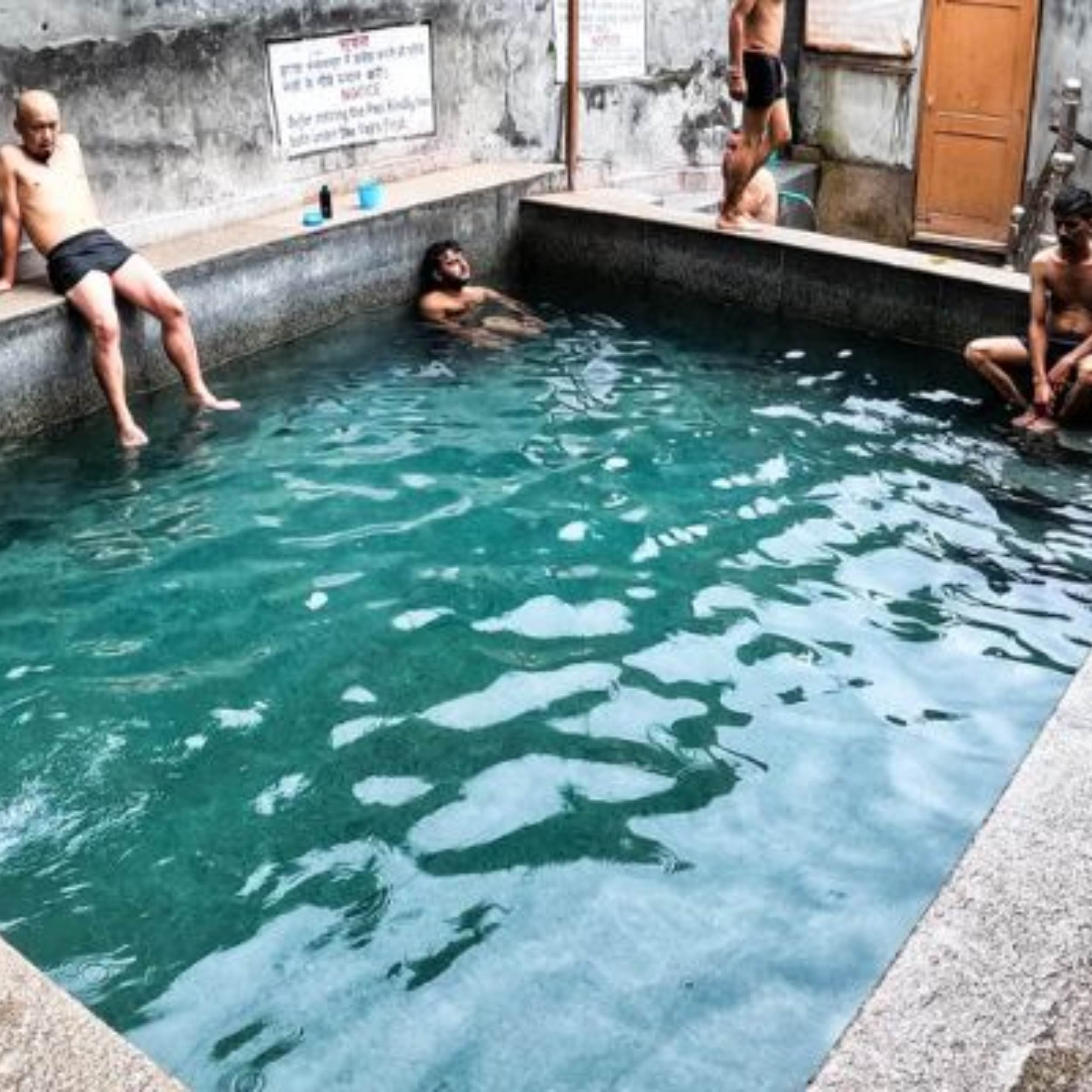 Vashisht Hot Springs bathing area near the ancient temple in Manali