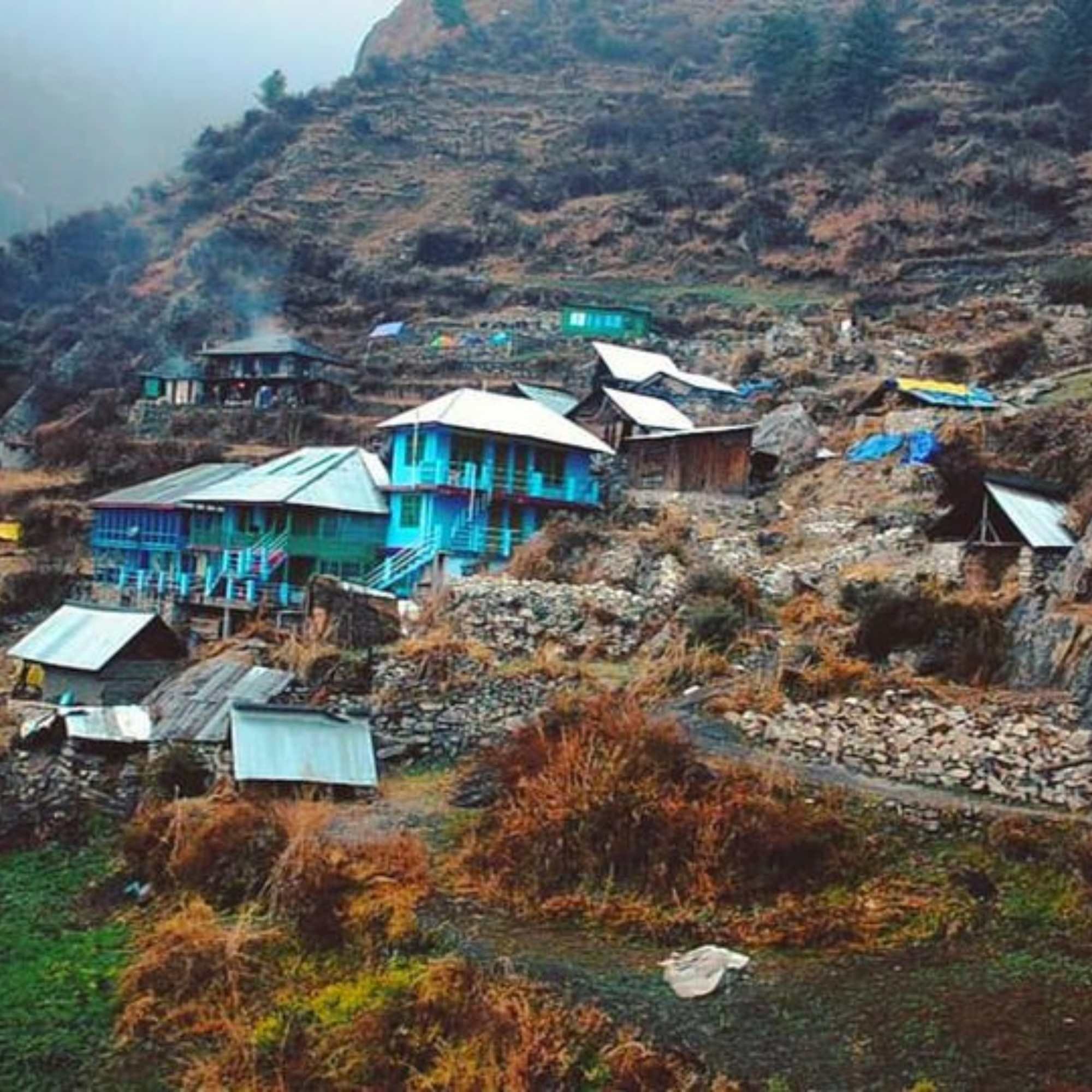 Traditional mountain homes and serene nature highlight the charm of Rasol Village.jpg