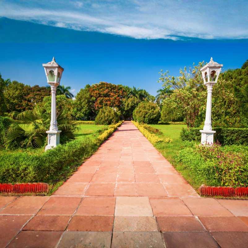Peaceful walkway inside Saheliyon Ki Bari garden.jpg