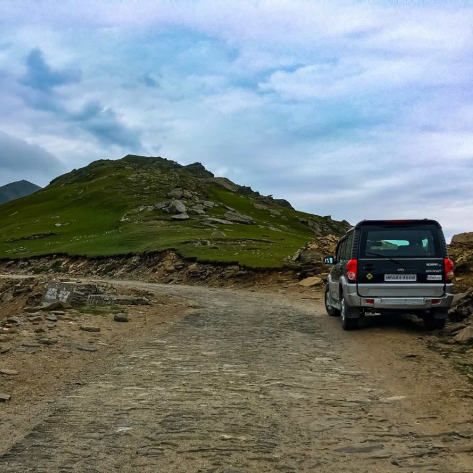 Scenic view of Larot near Rohru, Shimla, surrounded by peaceful mountains and natural Himalayan beauty.jpg