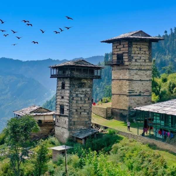 The Dhaliara Kothi twin towers in Raila village, Sainj Valley, built in traditional Kath Kuni stone and wood architecture