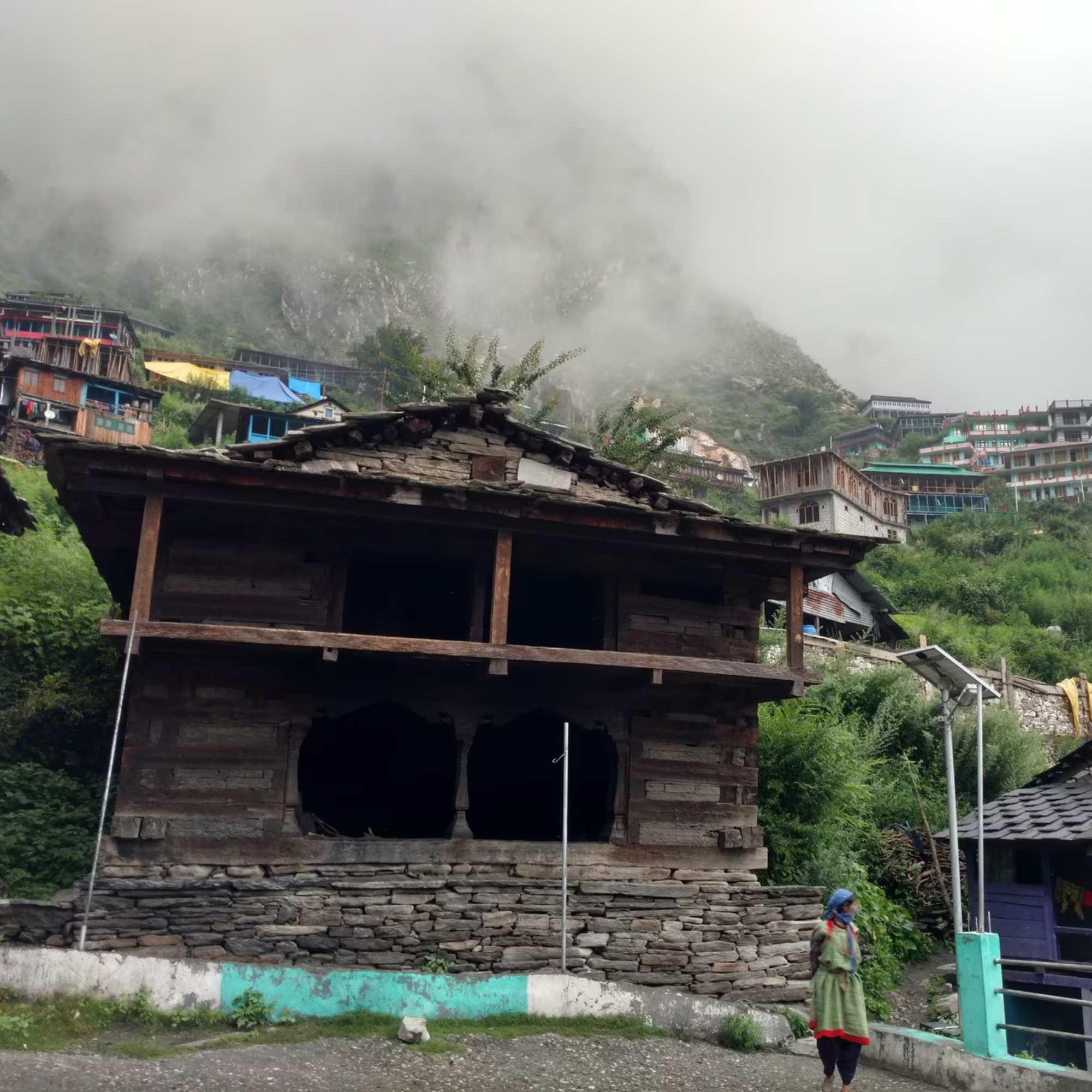 Scenic beauty of Rasol Village surrounded by dense forests, green meadows, and majestic mountains.jpg